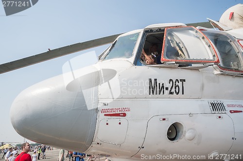 Image of Visitors explore cabin of MI-26T helicopter