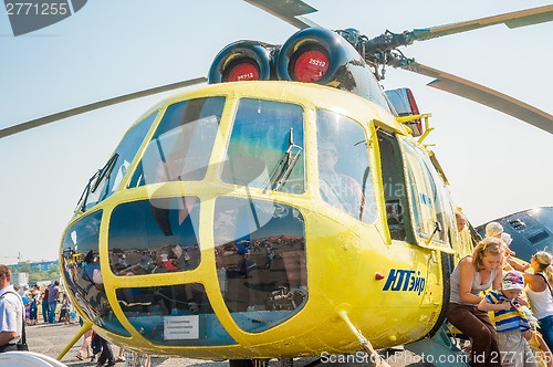 Image of Visitors exploring the MI-8 helicopter