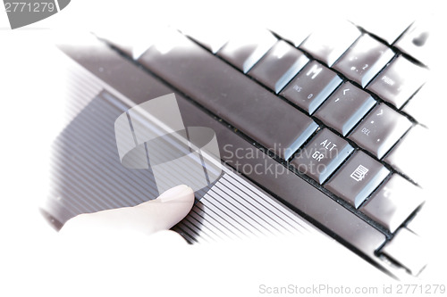 Image of Working at laptop .