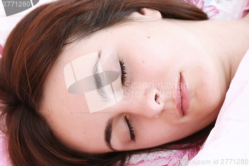 Image of Beautiful young woman sleeping.