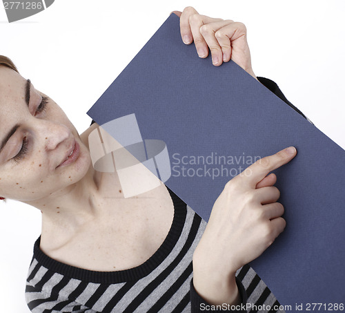 Image of Woman holding a paper