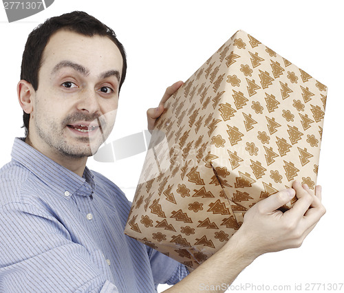 Image of Young man holding a present