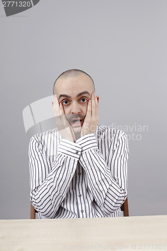 Image of Man at desk