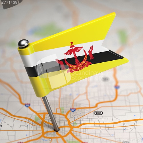 Image of Brunei Small Flag on a Map Background.