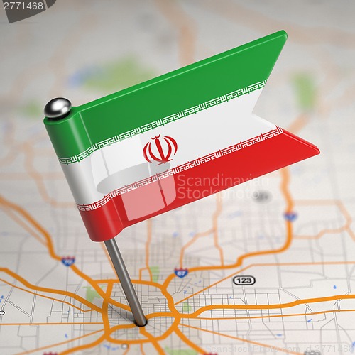Image of Iran Small Flag on a Map Background.