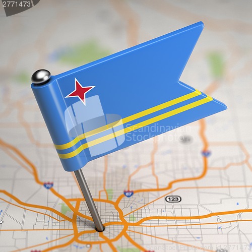 Image of Aruba Small Flag on a Map Background.