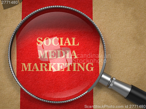 Image of Social Media Marketing. Magnifying Glass on Old Paper.