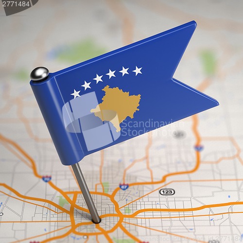 Image of Kosovo Small Flag on a Map Background.