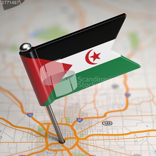 Image of Sahrawi Republic Small Flag on a Map Background.
