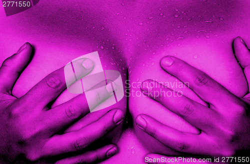 Image of Hands covering breasts