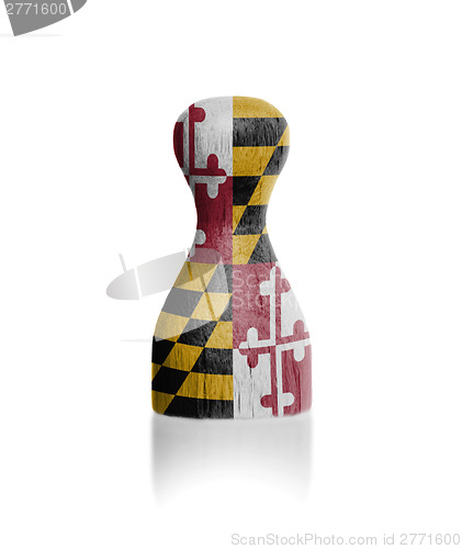 Image of Wooden pawn with a flag painting