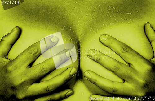 Image of Hands covering breasts