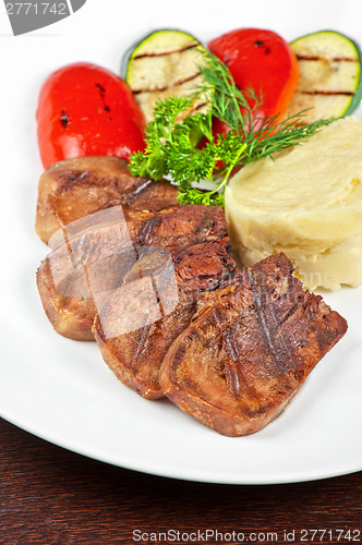 Image of tongue with grilled vegetable