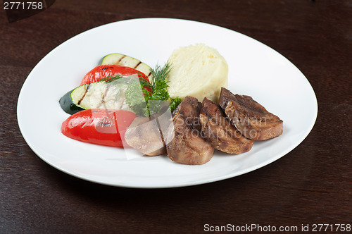 Image of tongue with grilled vegetable