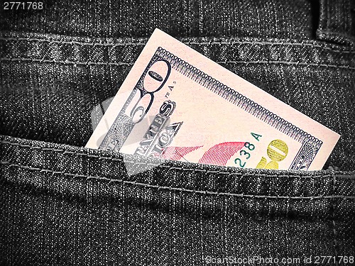 Image of Fifty dollars in jeans pocket