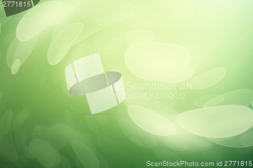 Image of Green background with abnormal magic bokeh lights