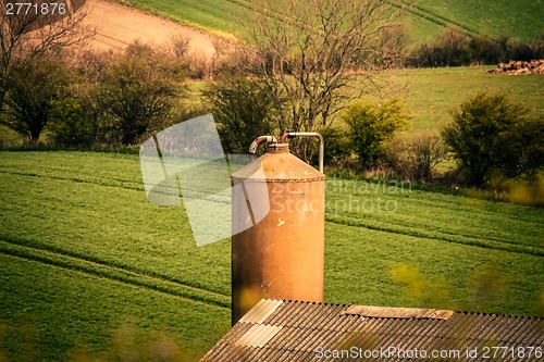 Image of Silo storage with a field in the background