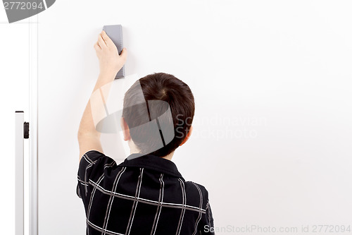 Image of young boy student and whiteboard