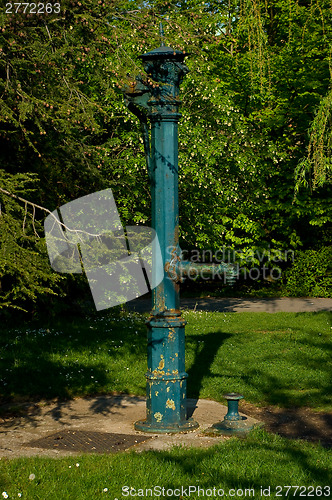 Image of The old cast iron water pump.