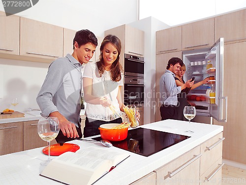 Image of Friends Preparing spaghetti