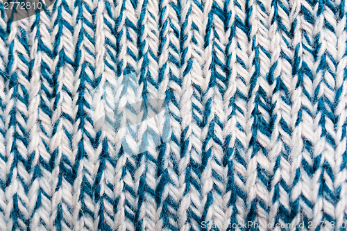 Image of white and blue woolen threads