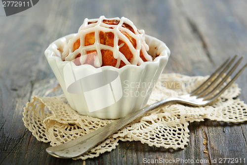 Image of Cupcake with icing and fork.