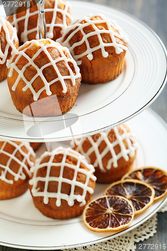 Image of Stand with lemon cupcakes.