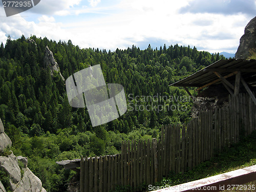 Image of old fortress in forest in Carpathian mountains