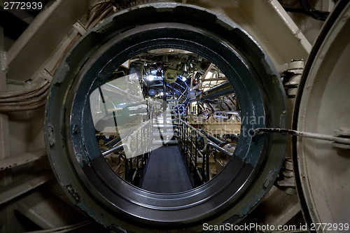 Image of submarine interior view through manhole