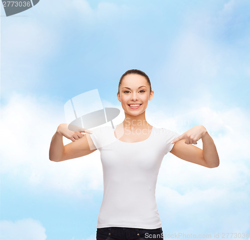 Image of smiling woman in blank white t-shirt