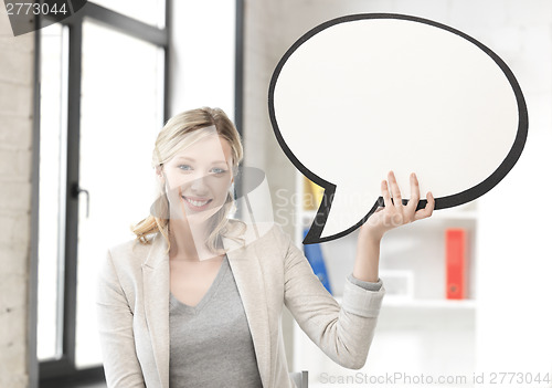 Image of smiling businesswoman with blank text bubble