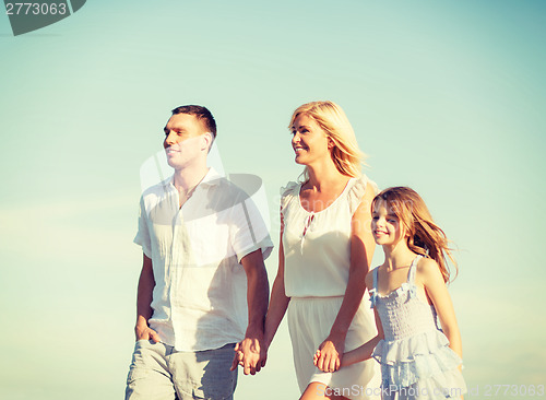 Image of happy family at the seaside