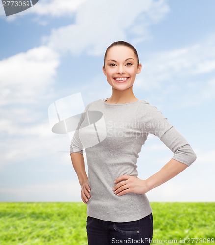 Image of smiling asian woman over white background