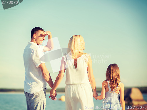 Image of happy family at the seaside