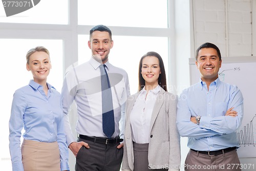 Image of happy business team in office