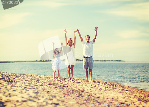 Image of happy family at the seaside