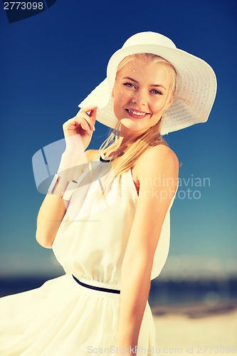 Image of beautiful woman enjoying summer outdoors