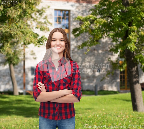 Image of smiling young woman in casual clothes