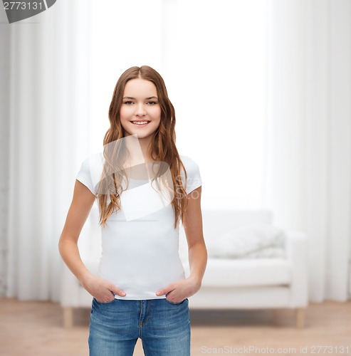 Image of smiling teenager in blank white t-shirt