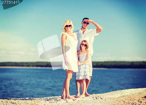 Image of happy family with blue sky