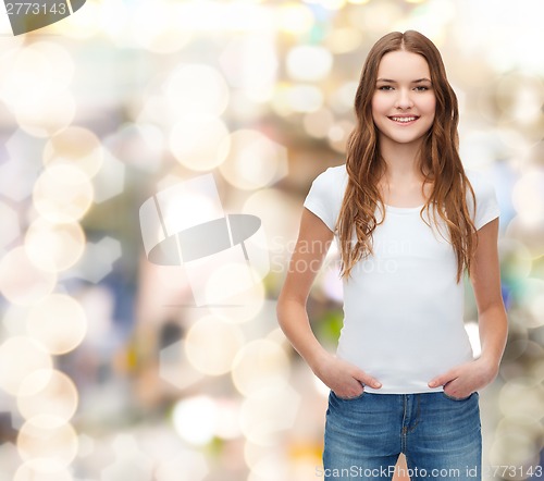 Image of smiling teenager in blank white t-shirt