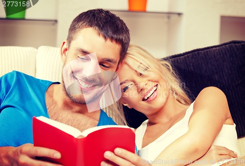 Image of happy couple at home