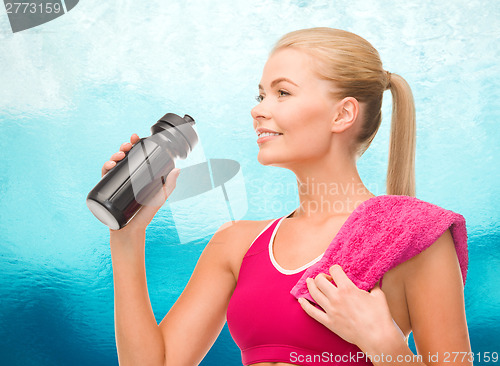 Image of sporty woman with special sportsman bottle