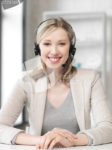 Image of friendly female helpline operator