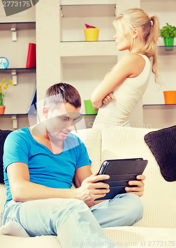 Image of couple with tablet PC