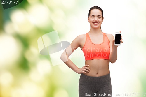 Image of sporty woman with smartphone