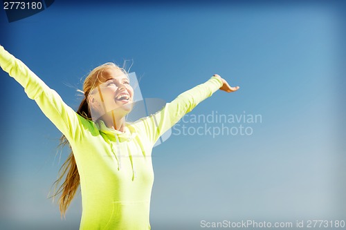 Image of woman doing sports outdoors