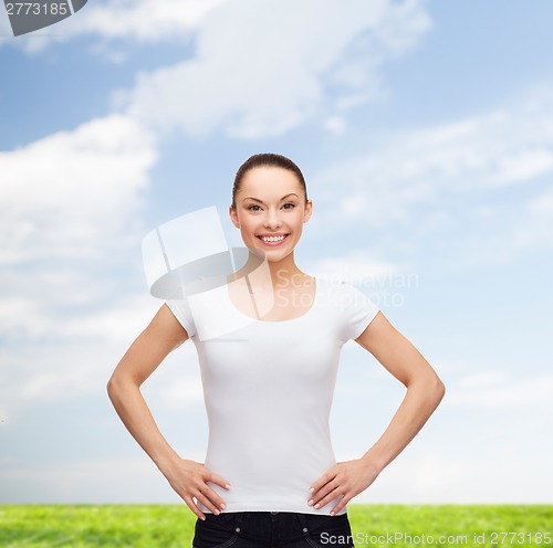 Image of smiling woman in blank white t-shirt