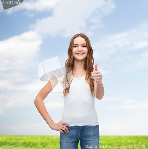 Image of smiling teenager in blank white t-shirt