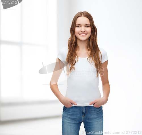 Image of smiling teenager in blank white t-shirt